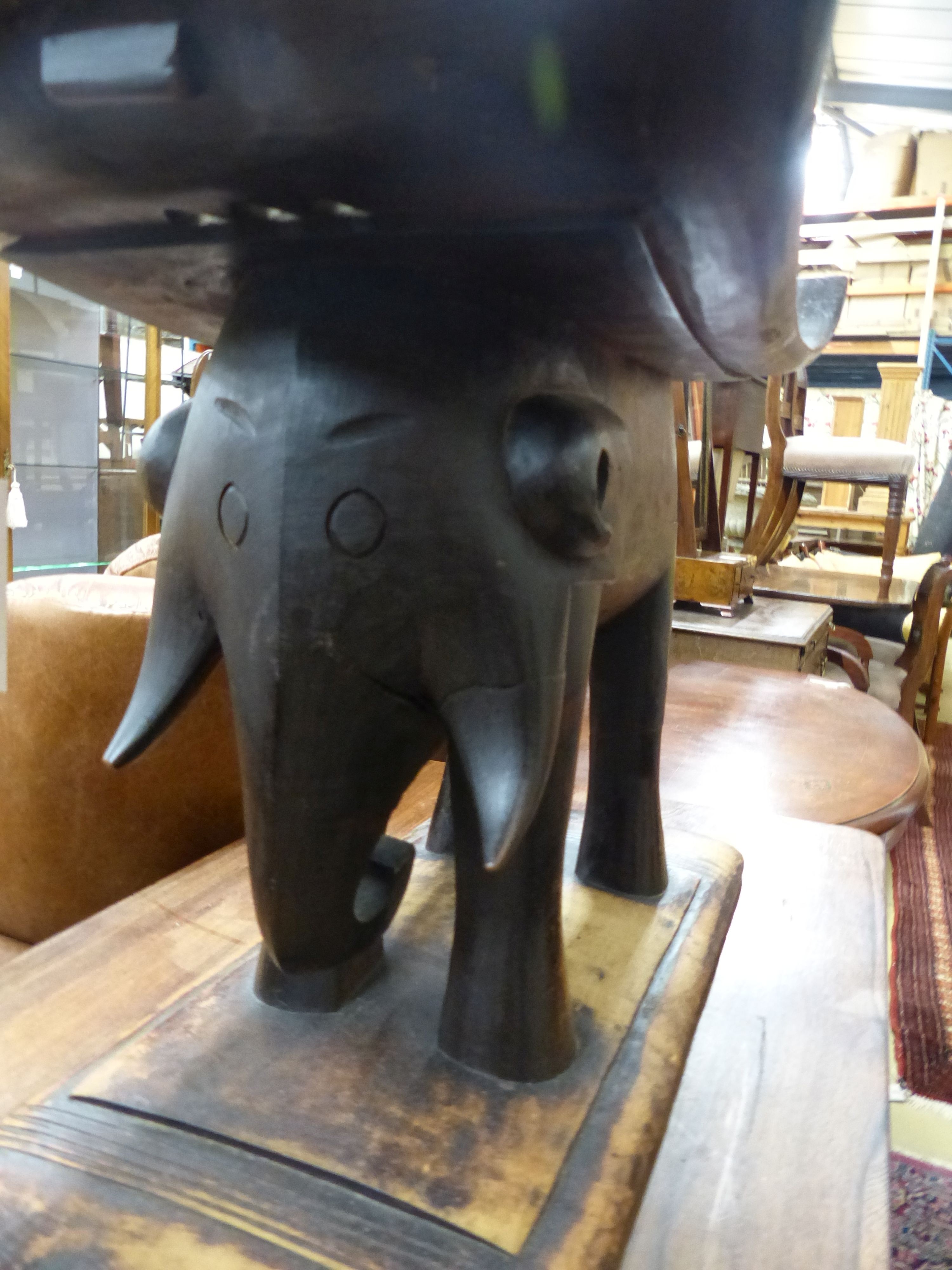 An Ashanti carved elephant stool, W.54cm D.31cm H.41cm